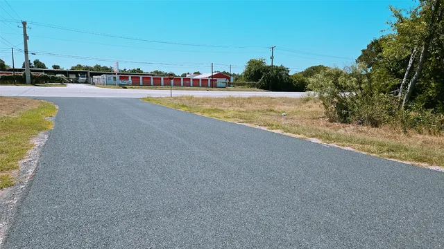 a view of a swimming pool and an outdoor seating