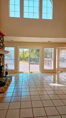 a view of empty room with windows