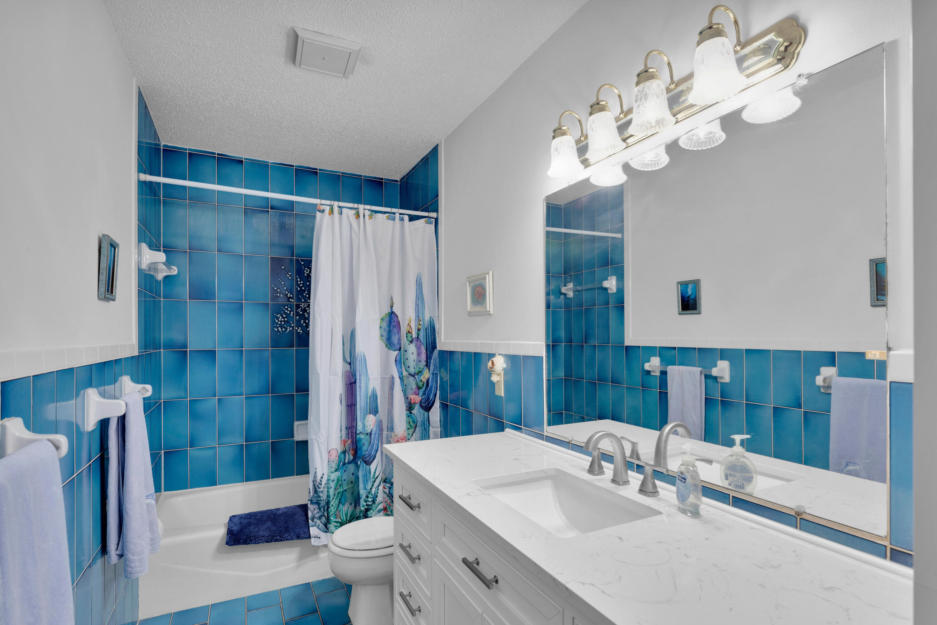 300 3rd Street Key Colony Beach, FL 33051 - Photo 24 of 51 a bathroom with a sink a toilet and shower
