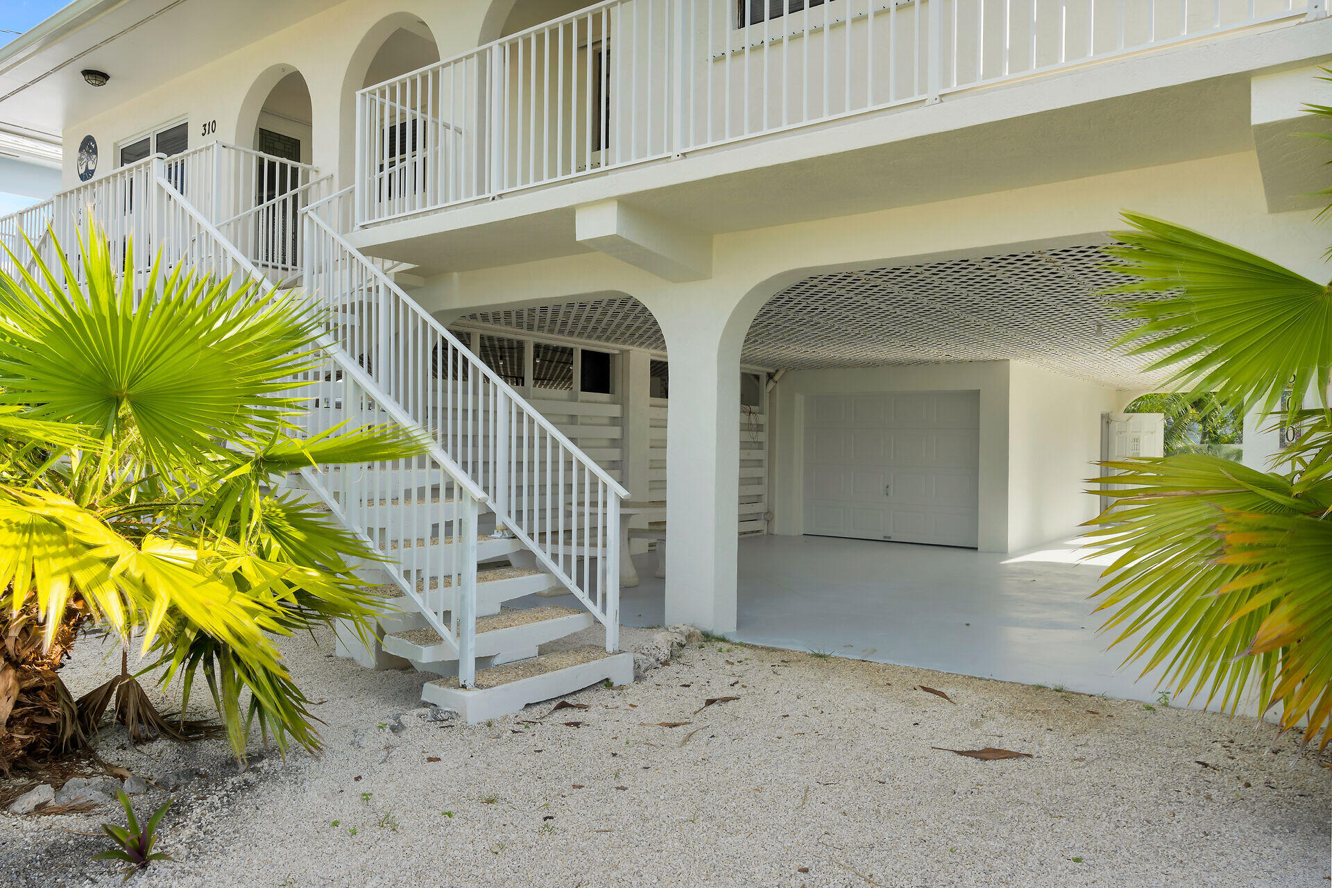 300 3rd Street Key Colony Beach, FL 33051 - Photo 26 of 51 a view of a house with a staircase