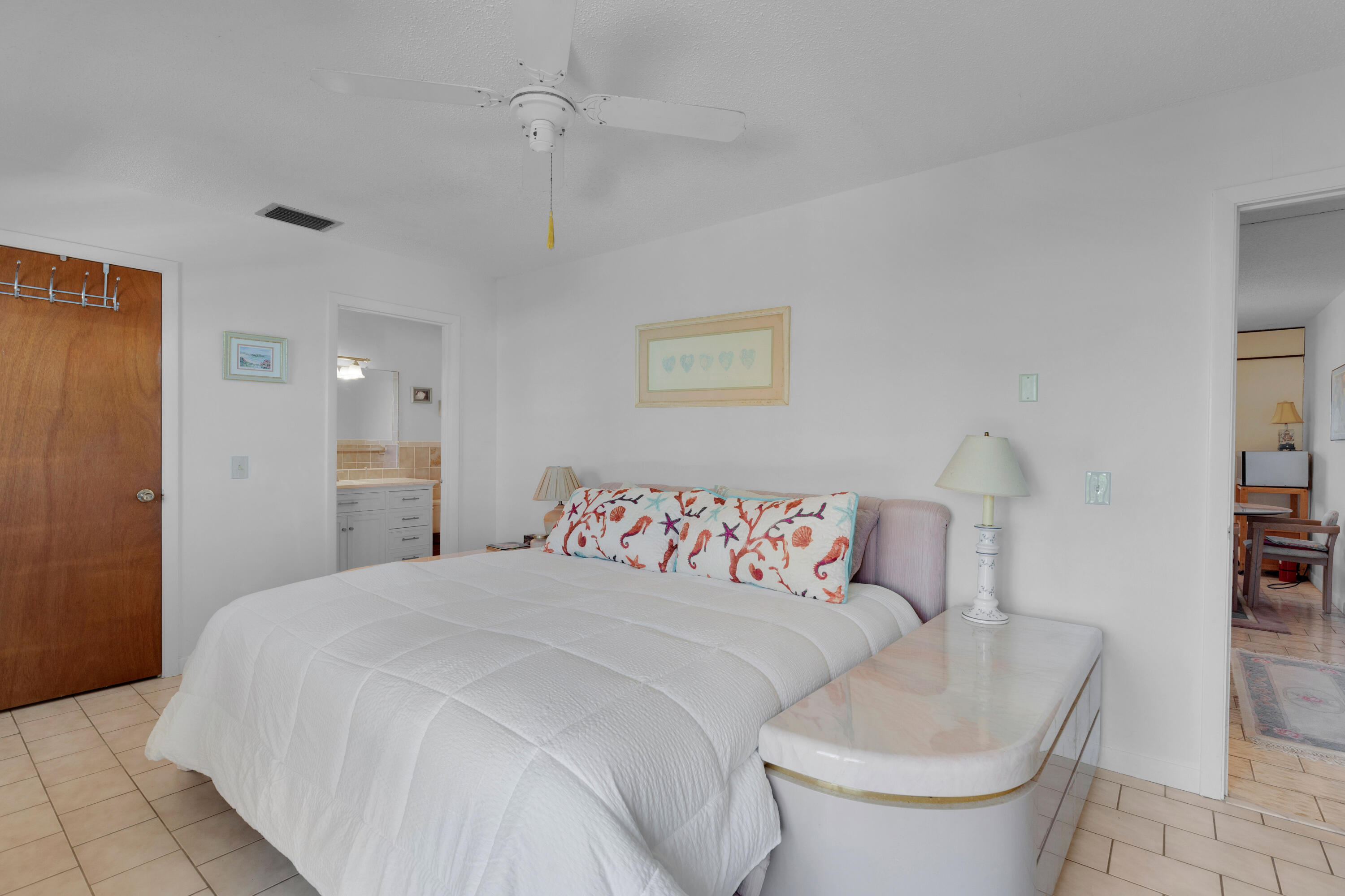 300 3rd Street Key Colony Beach, FL 33051 - Photo 10 of 51 a bedroom with a bed and a couch