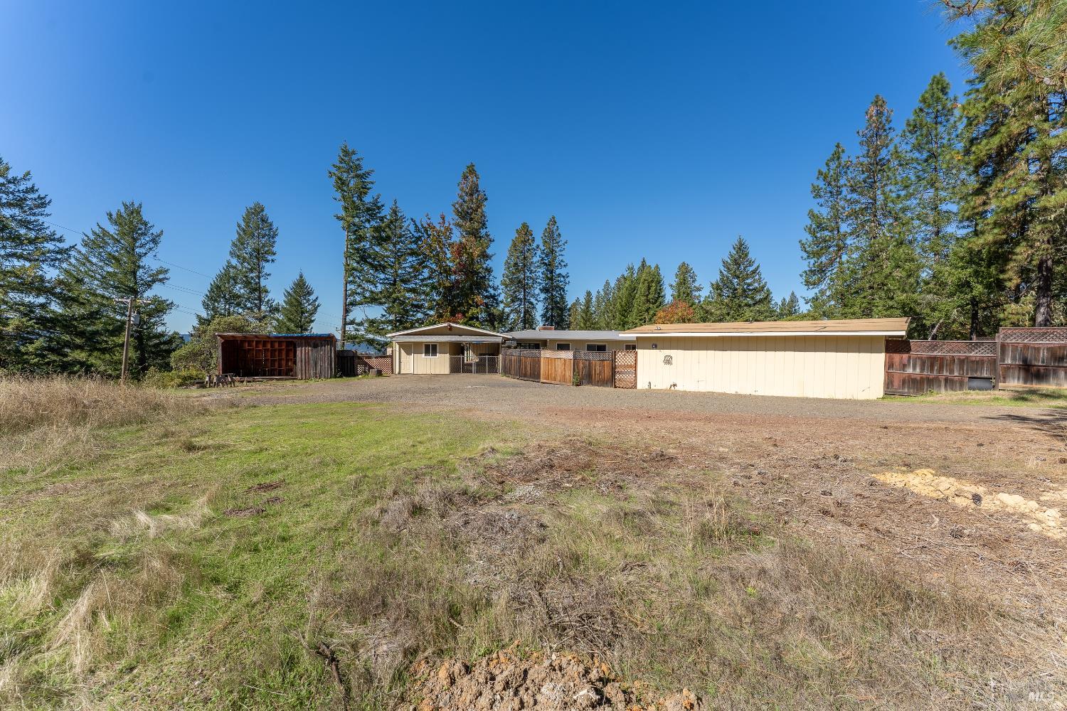 3651 Ridgewood Road Willits, CA 95490 - Photo 40 of 46 Third gated entry on property takes you to a large parking area with carport access.
