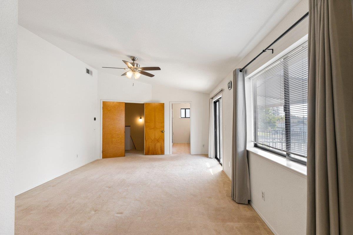 9930 Calvine Road Sacramento, CA 95829 - Photo 19 of 85 Large Primary Suite (upper level) with sitting area and balcony