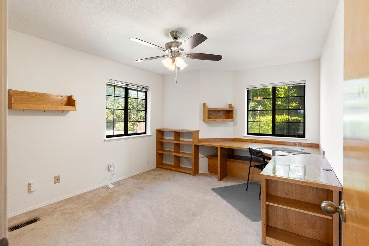 9930 Calvine Road Sacramento, CA 95829 - Photo 21 of 97 a view of workspace with furniture and window