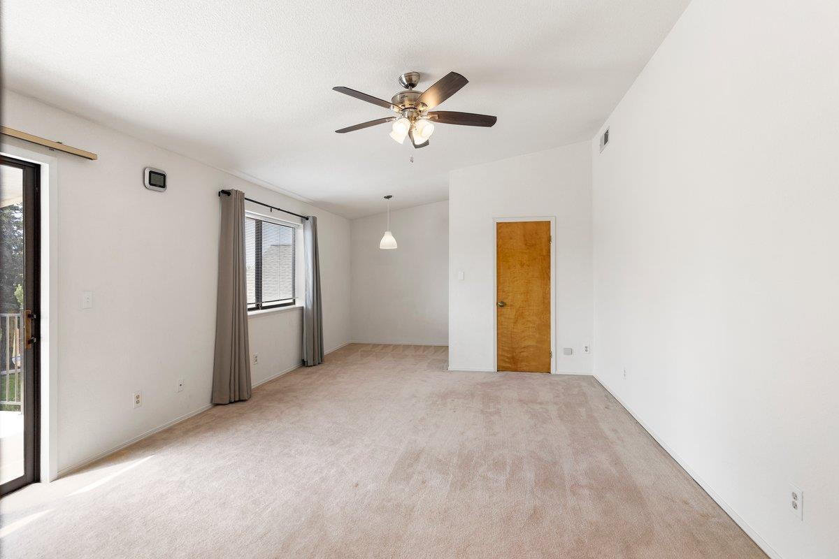 9930 Calvine Road Sacramento, CA 95829 - Photo 27 of 97 a view of a livingroom with a ceiling fan and window