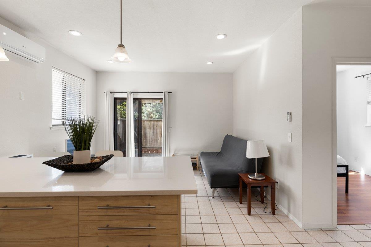 9930 Calvine Road Sacramento, CA 95829 - Photo 33 of 85 In-Law-Quarters 1 Living Room with 9-Foot Ceilings, Quartz Peninsula Island with Pull-Out Storage Drawers