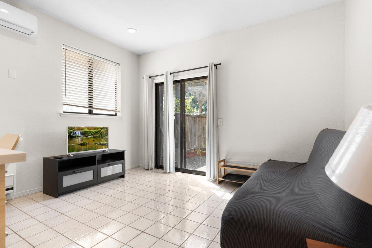 9930 Calvine Road Sacramento, CA 95829 - Photo 43 of 97 a bedroom with furniture and a window
