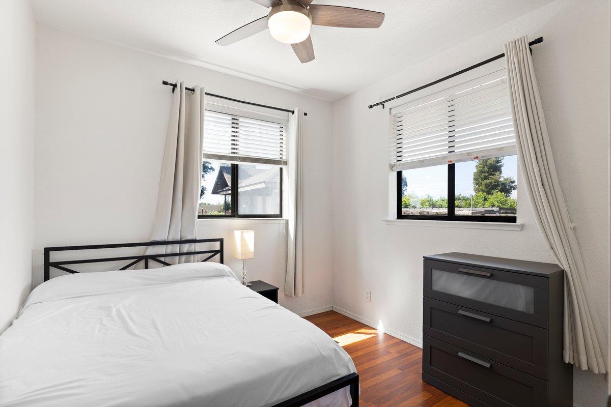 9930 Calvine Road Sacramento, CA 95829 - Photo 46 of 97 a bedroom with a bed and a window