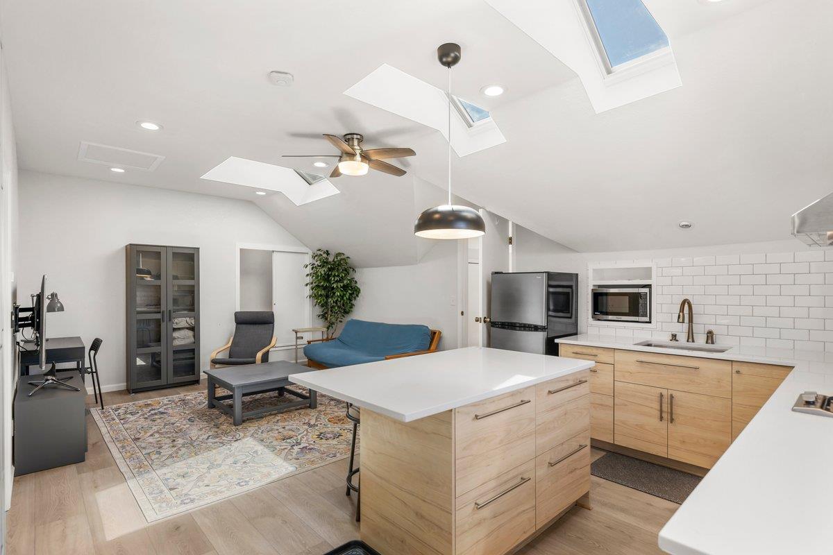 9930 Calvine Road Sacramento, CA 95829 - Photo 50 of 97 a view of kitchen with sink microwave and refrigerator