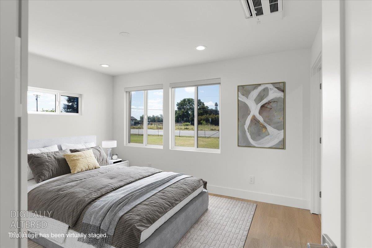 9930 Calvine Road Sacramento, CA 95829 - Photo 86 of 97 a bedroom with a bed and a window