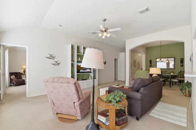 a kitchen with sink a stove and refrigerator