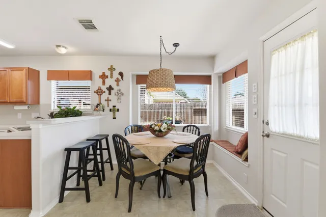 a kitchen with stainless steel appliances granite countertop a stove and a sink