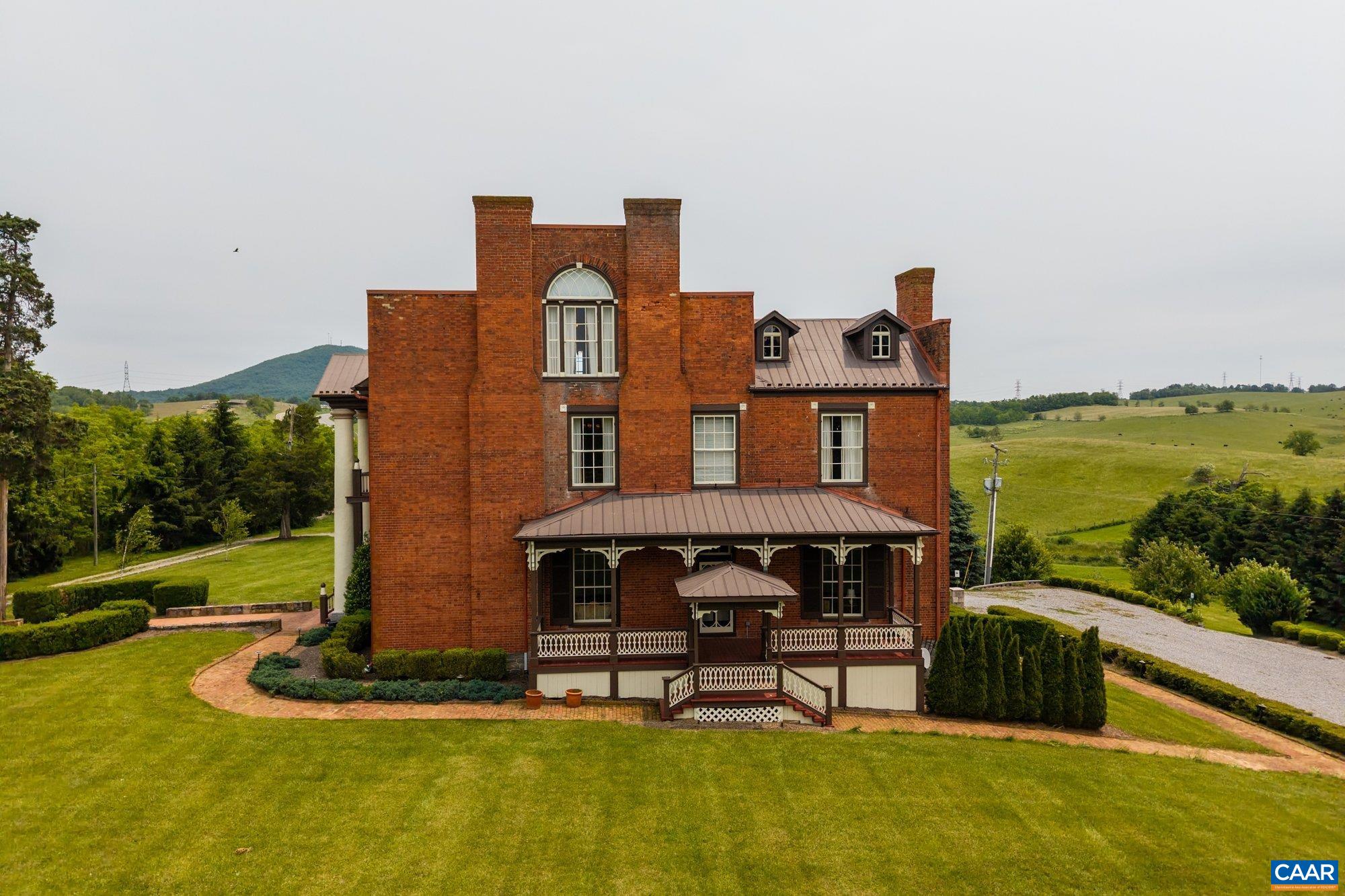 325 B Factory Outlet Drive Max Meadows, VA 24360 - Photo 7 of 66 a front view of a house with a yard