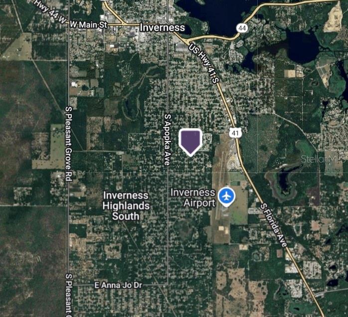 6601 East Gentry Street Inverness, FL 34452 - Photo 4 of 6 a view of a door and yard