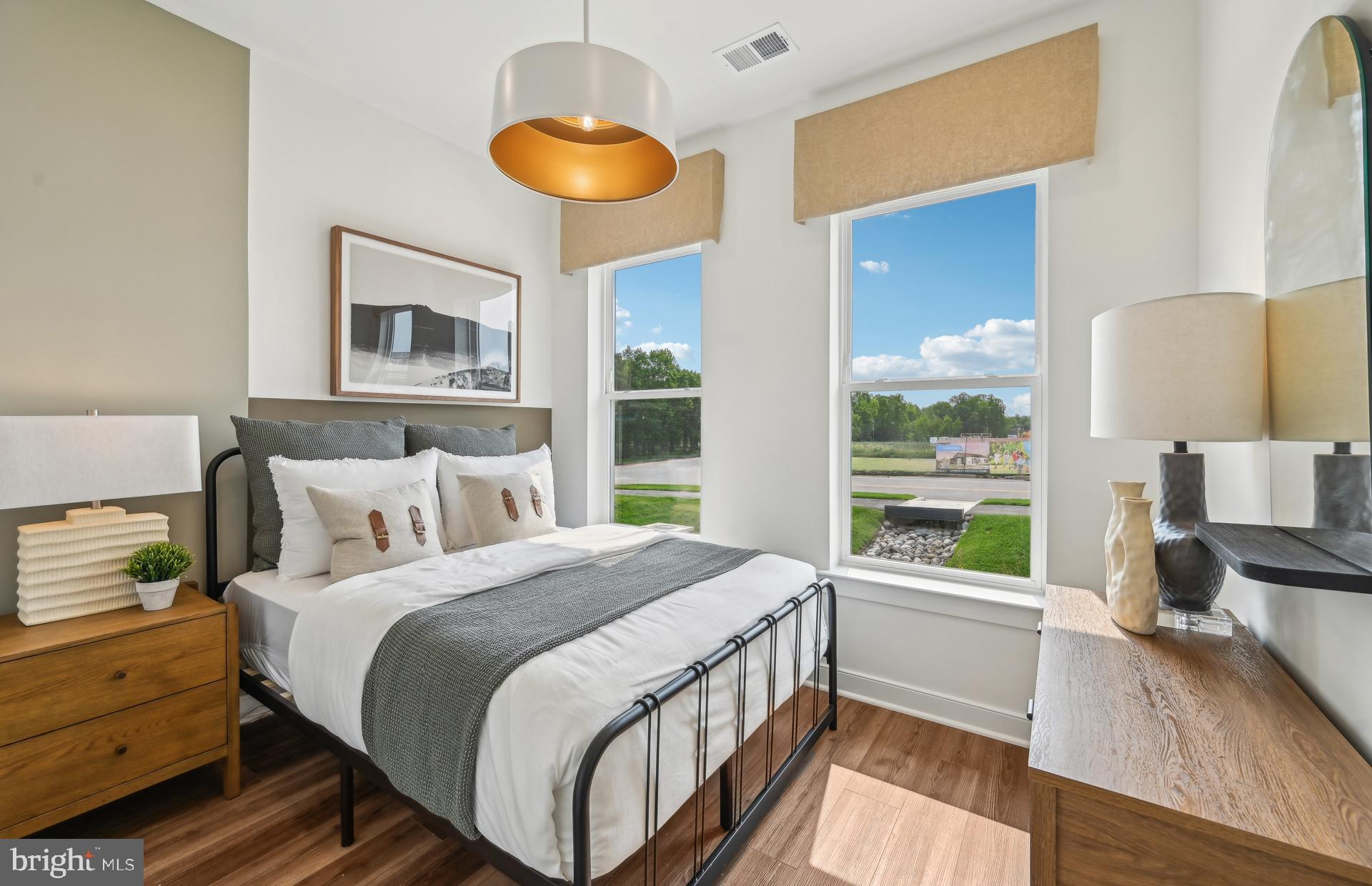 505 Crossvine Lane Laurel, MD 20724 - Photo 2 of 54 a bedroom with a bed and a large window