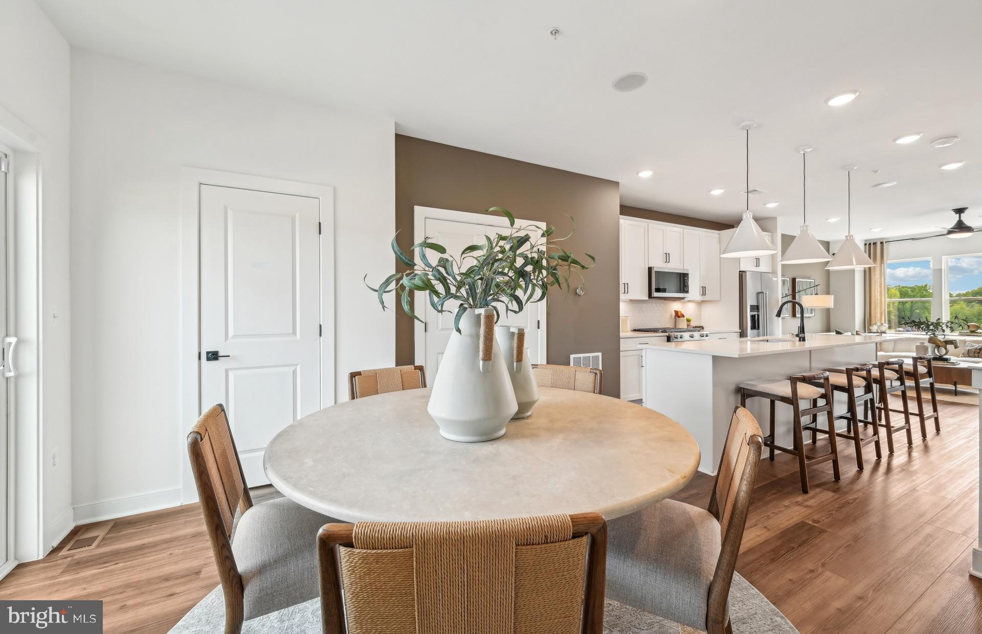505 Crossvine Lane Laurel, MD 20724 - Photo 8 of 54 a dining room with furniture and wooden floor