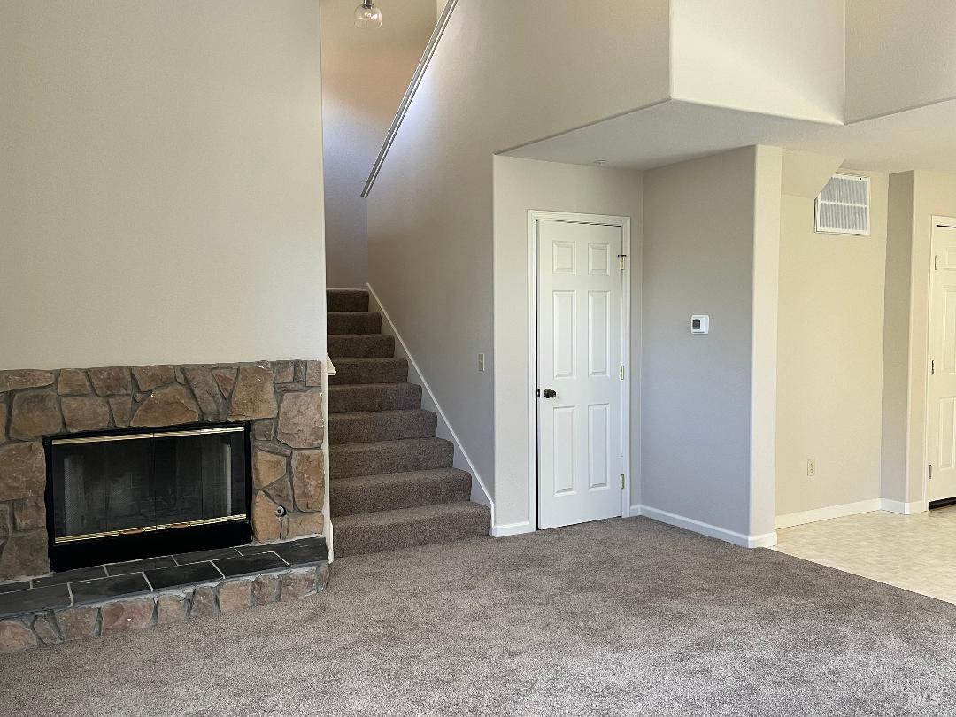 12 Monterey Court Novato, CA 94945 - Photo 7 of 15 a view of an empty room with stairs wooden floor and staircase