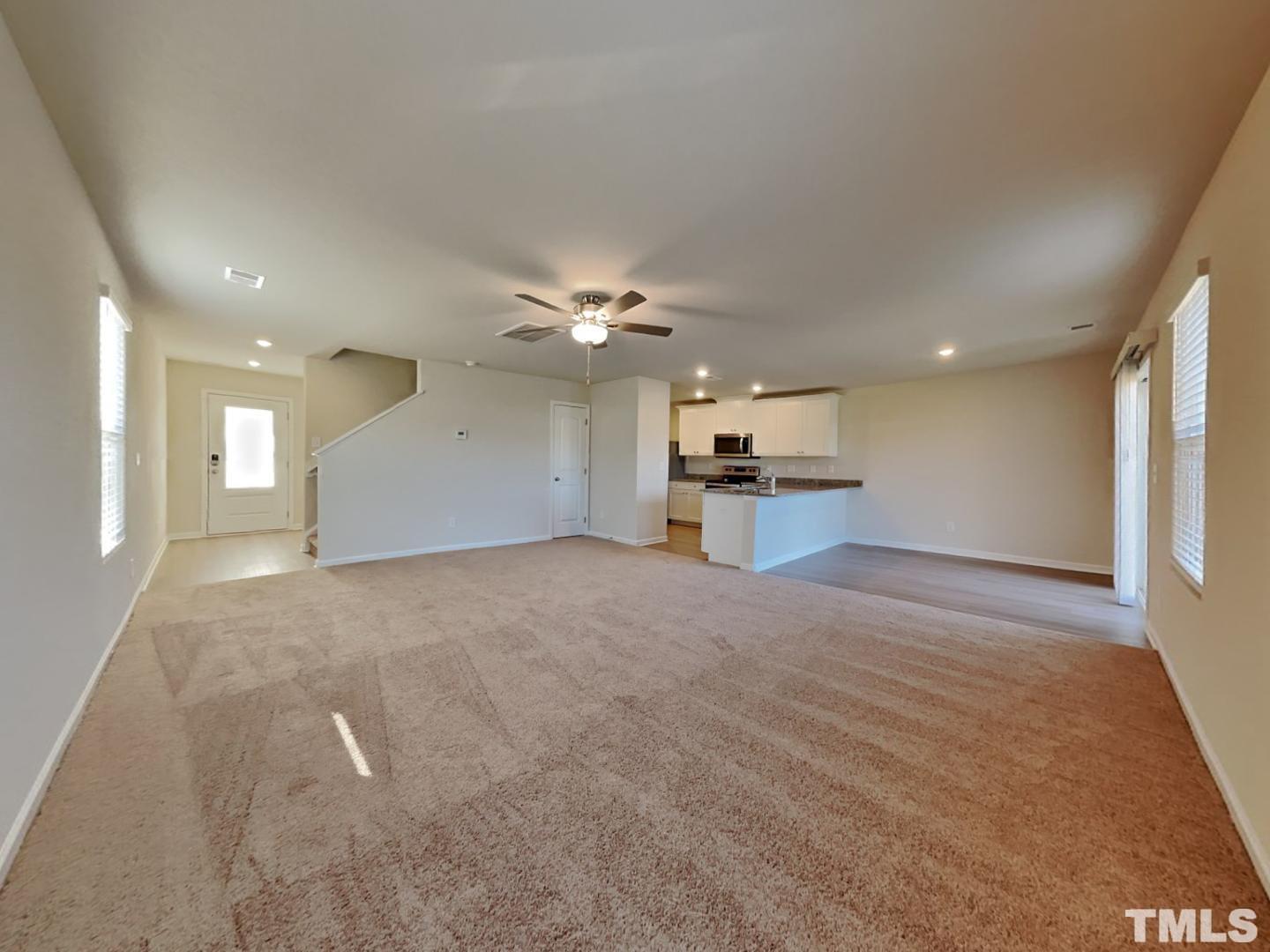 73 Barnsley Road Angier, NC 27501 - Photo 3 of 18 a view of a kitchen with a sink and a large window
