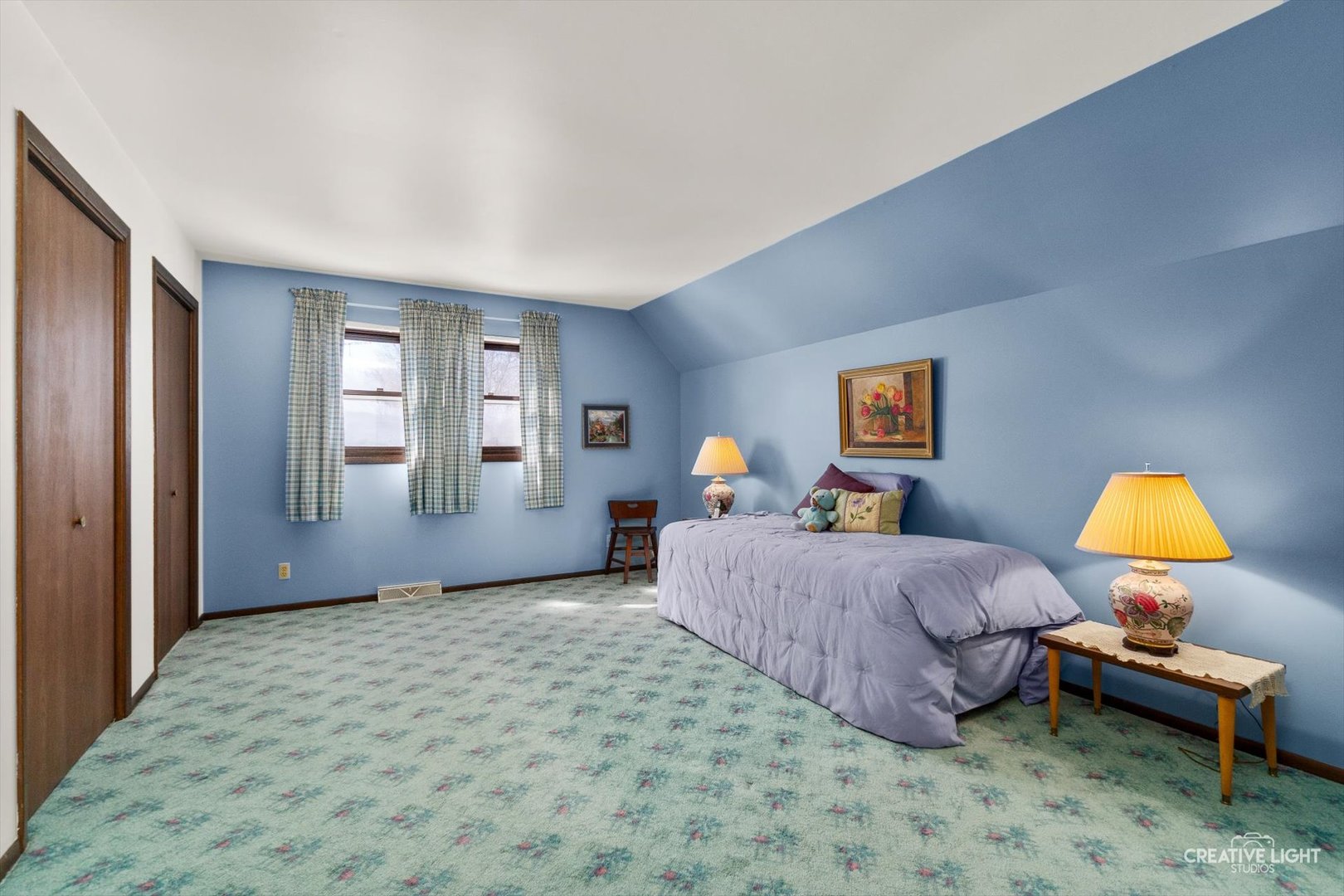 601 North View Street Hinckley, IL 60520 - Photo 12 of 18 a bedroom with a bed lamp on table and a window