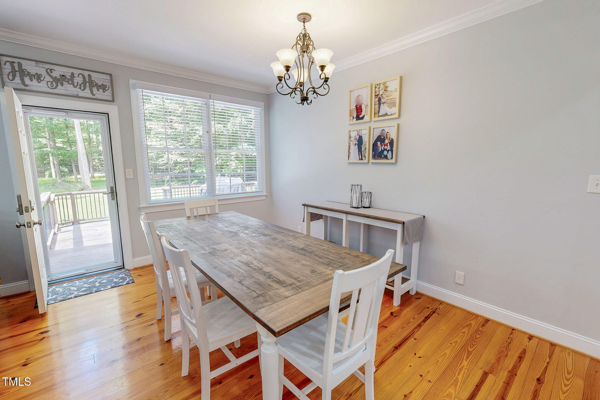 476 North Old Lantern Road Timberlake, NC 27583 - Photo 12 of 50 a view of a dining room with furniture window and wooden floor