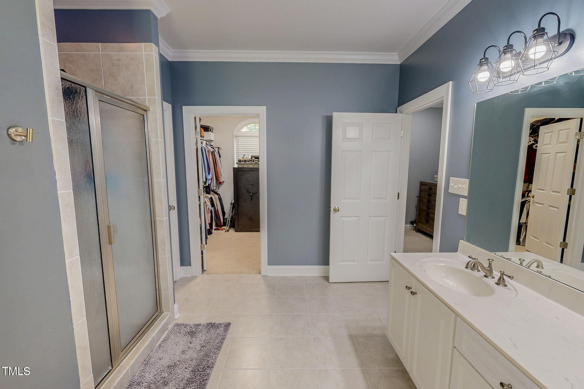 476 North Old Lantern Road Timberlake, NC 27583 - Photo 26 of 50 a bathroom with a double vanity sink and a mirror