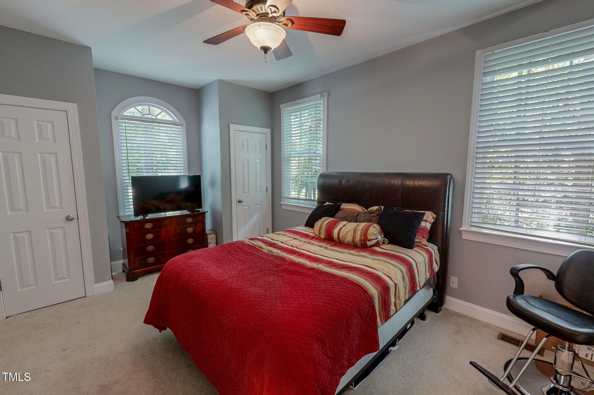 476 North Old Lantern Road Timberlake, NC 27583 - Photo 33 of 50 a bedroom with a large bed and a tv