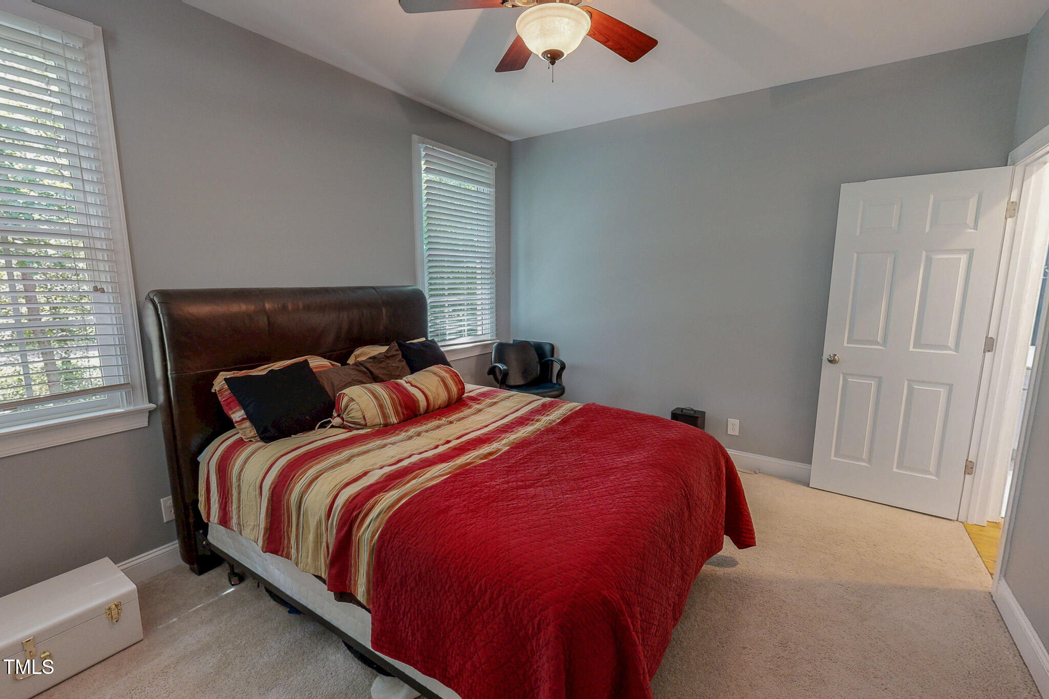 476 North Old Lantern Road Timberlake, NC 27583 - Photo 34 of 50 a bed sitting in a bedroom next to a window