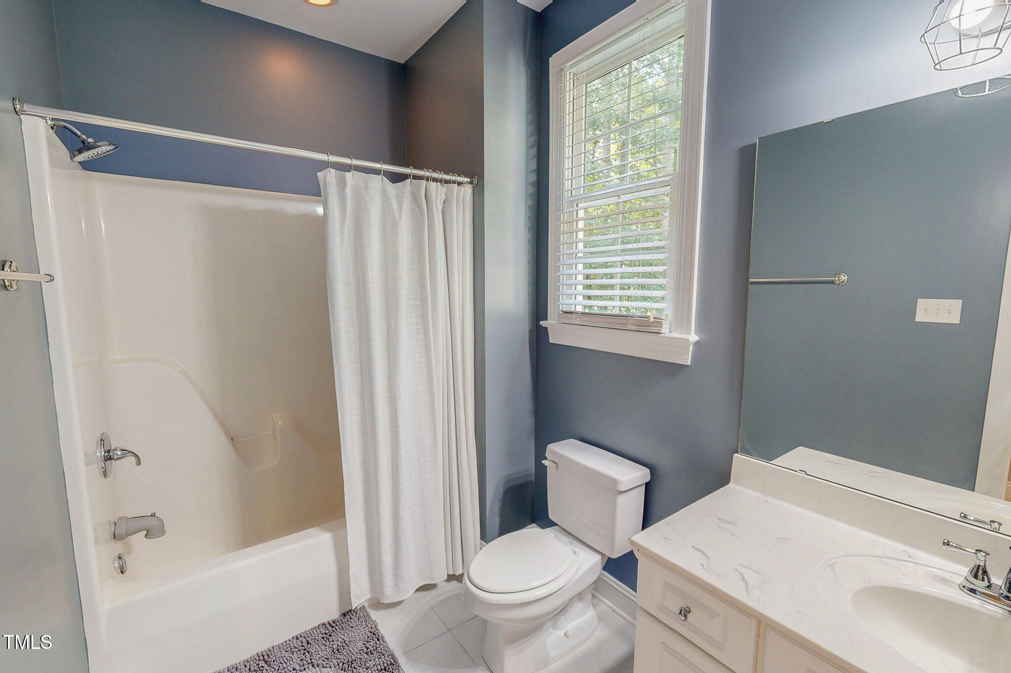 476 North Old Lantern Road Timberlake, NC 27583 - Photo 35 of 50 a bathroom with a sink toilet and shower