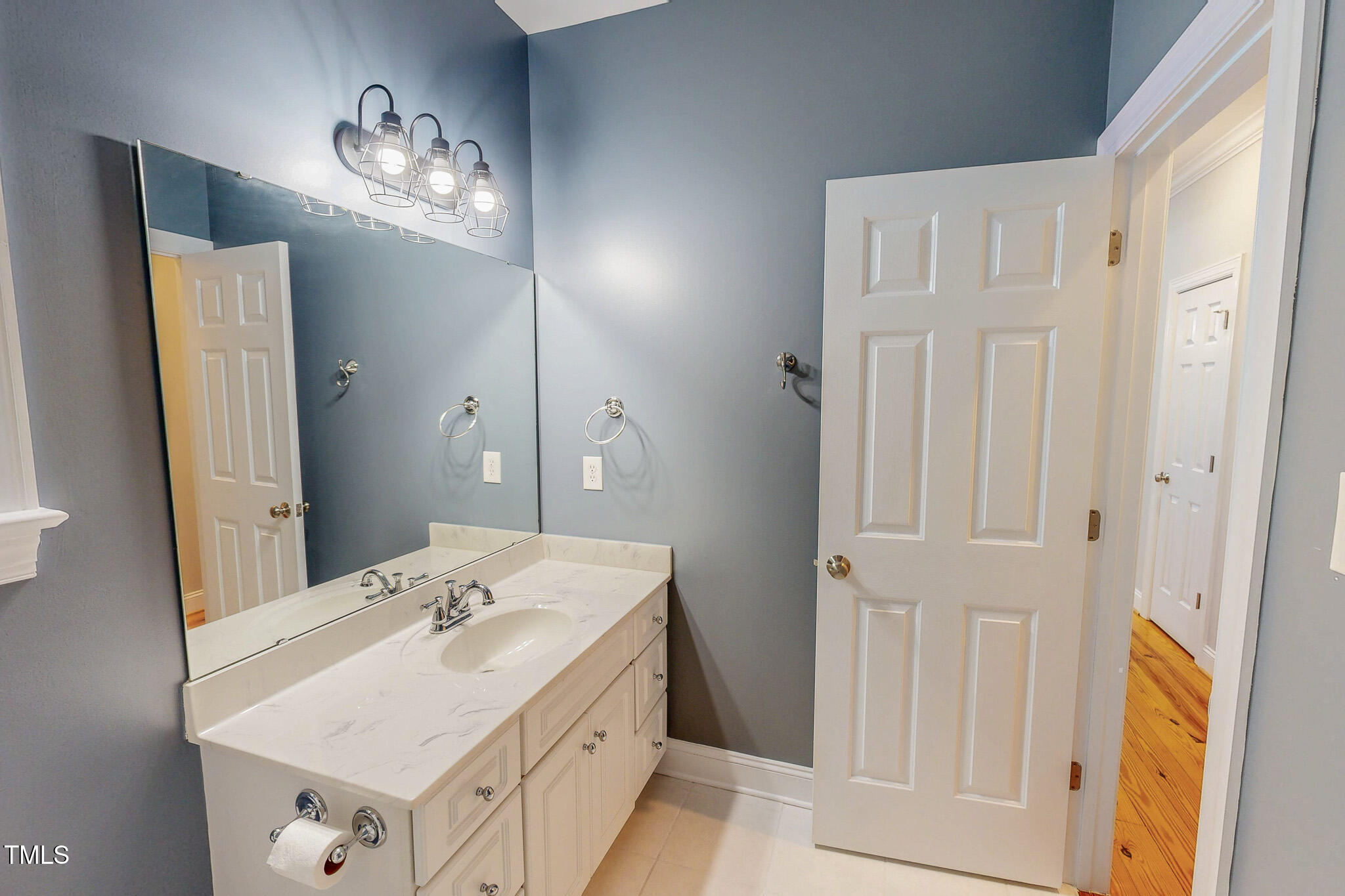 476 North Old Lantern Road Timberlake, NC 27583 - Photo 36 of 50 a bathroom with a sink and a mirror