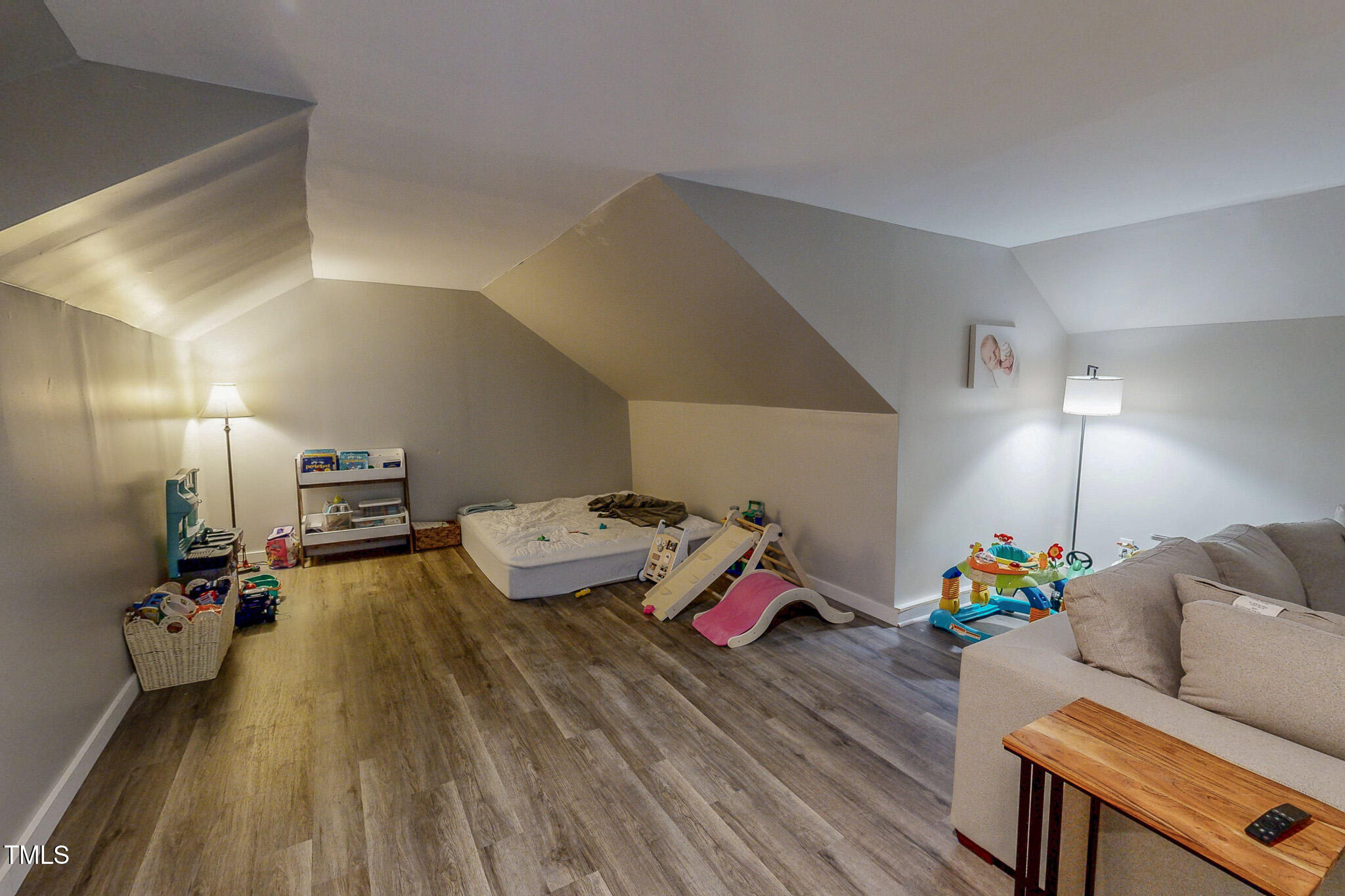 476 North Old Lantern Road Timberlake, NC 27583 - Photo 38 of 50 a living room with furniture and a wooden floor