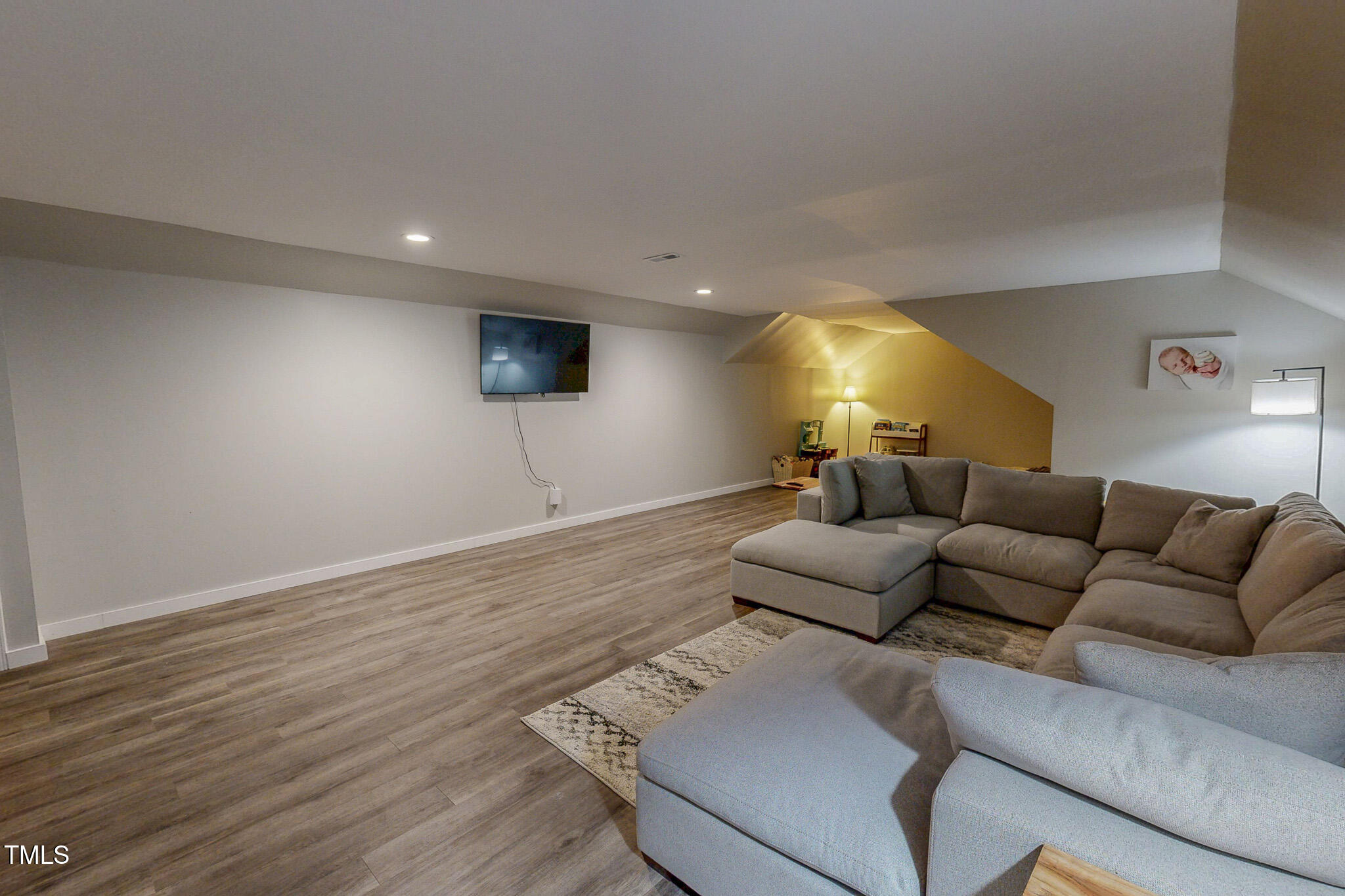 476 North Old Lantern Road Timberlake, NC 27583 - Photo 41 of 50 a living room with furniture and a flat screen tv