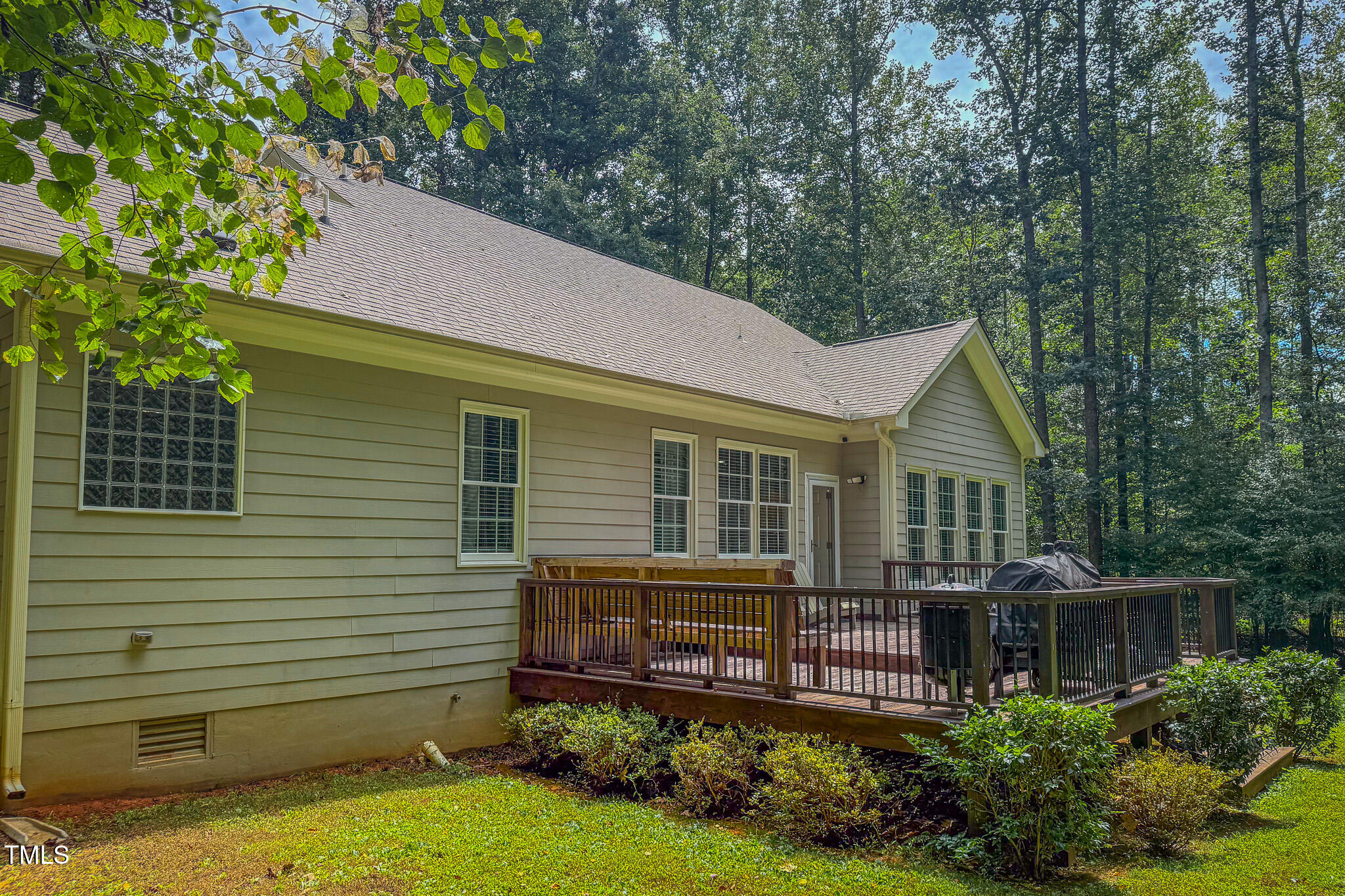 476 North Old Lantern Road Timberlake, NC 27583 - Photo 44 of 50 a backyard of a house with lots of green space