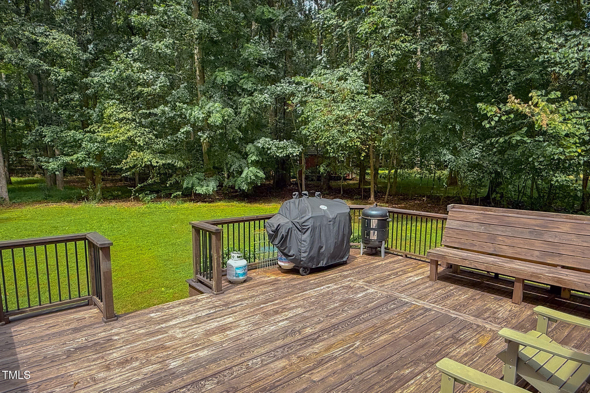 476 North Old Lantern Road Timberlake, NC 27583 - Photo 45 of 50 a view of a deck with table and chairs a barbeque with wooden floor and fence