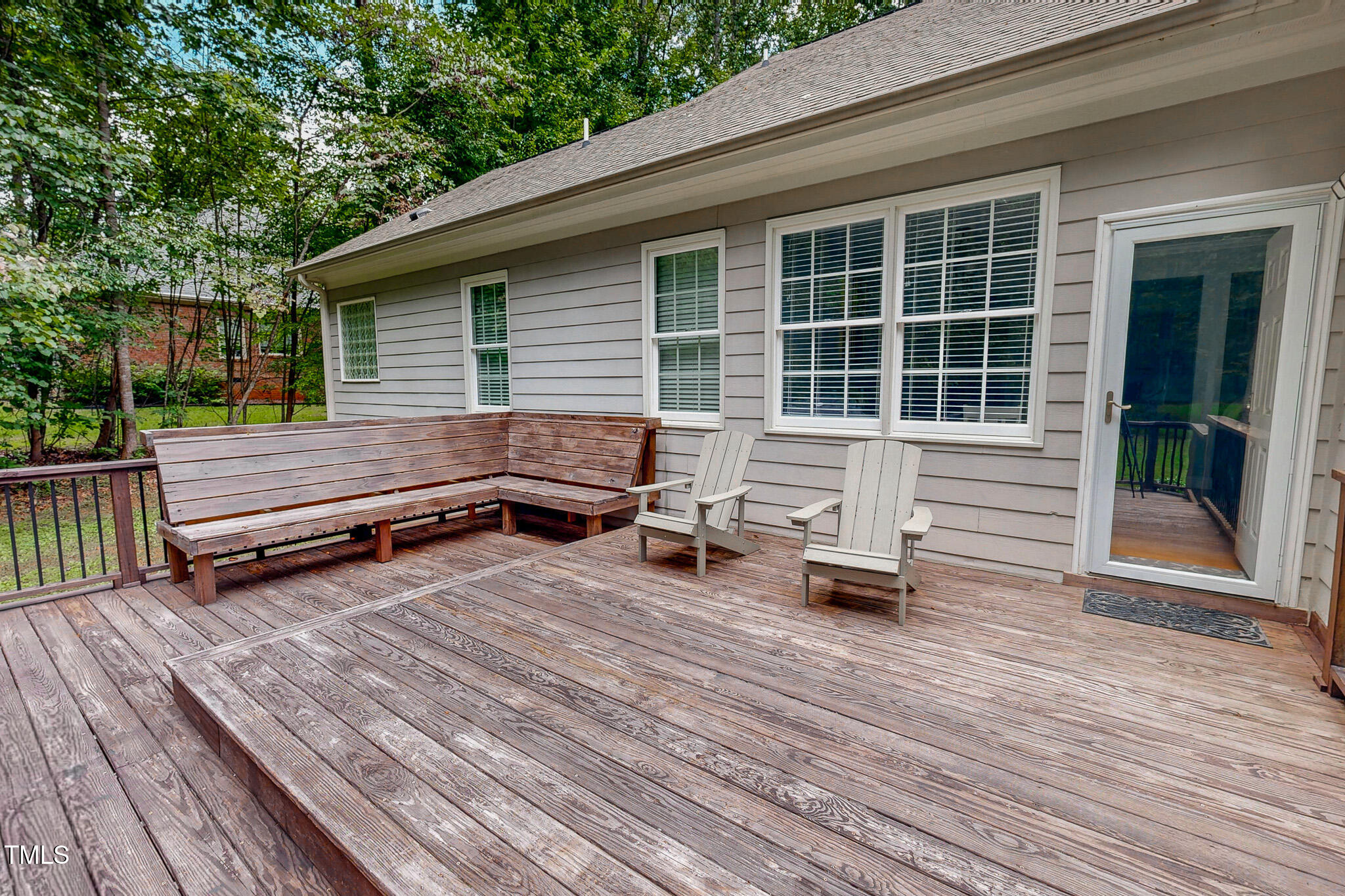 476 North Old Lantern Road Timberlake, NC 27583 - Photo 6 of 50 a backyard of a house with barbeque oven and outdoor seating