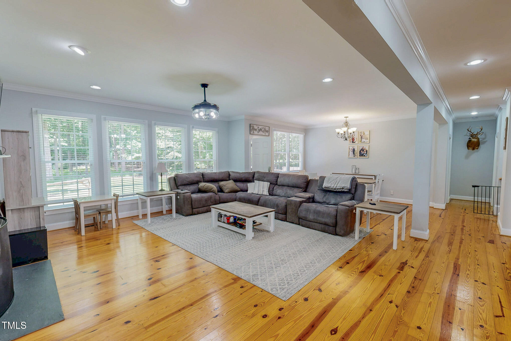476 North Old Lantern Road Timberlake, NC 27583 - Photo 8 of 50 a living room with lots of furniture and a large window