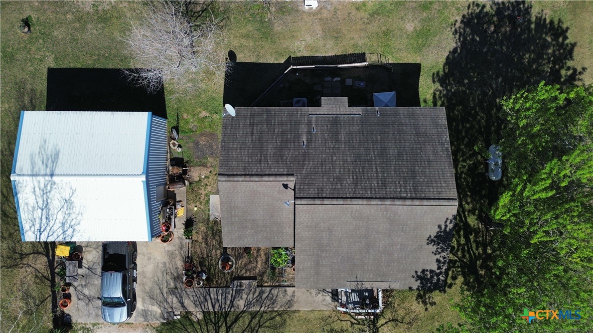 802 Bay Street Austwell, TX 77950 - Photo 25 of 27 an aerial view of a house with a yard
