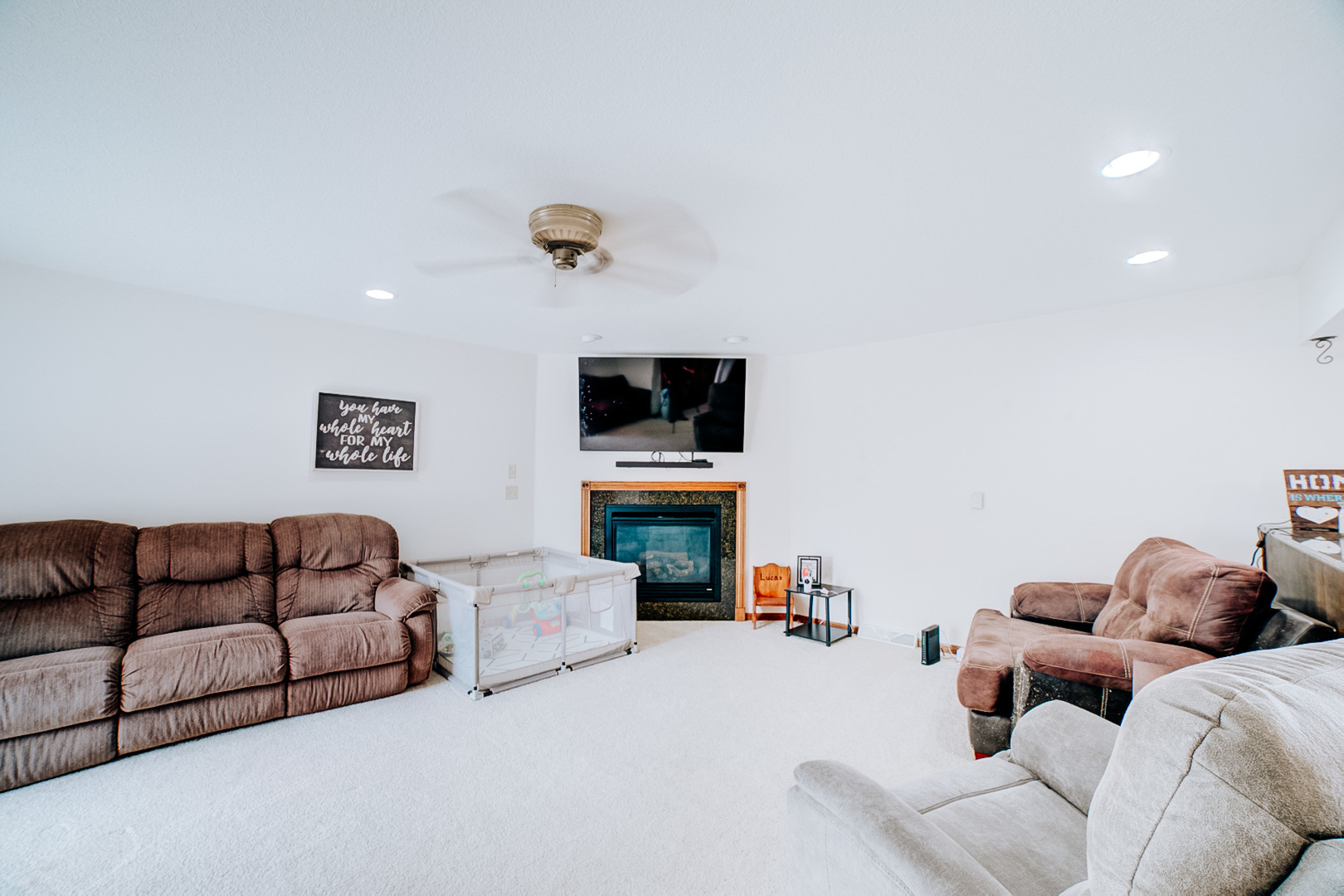 905 South 4th Street Watseka, IL 60970 - Photo 11 of 29 a living room with furniture and a flat screen tv