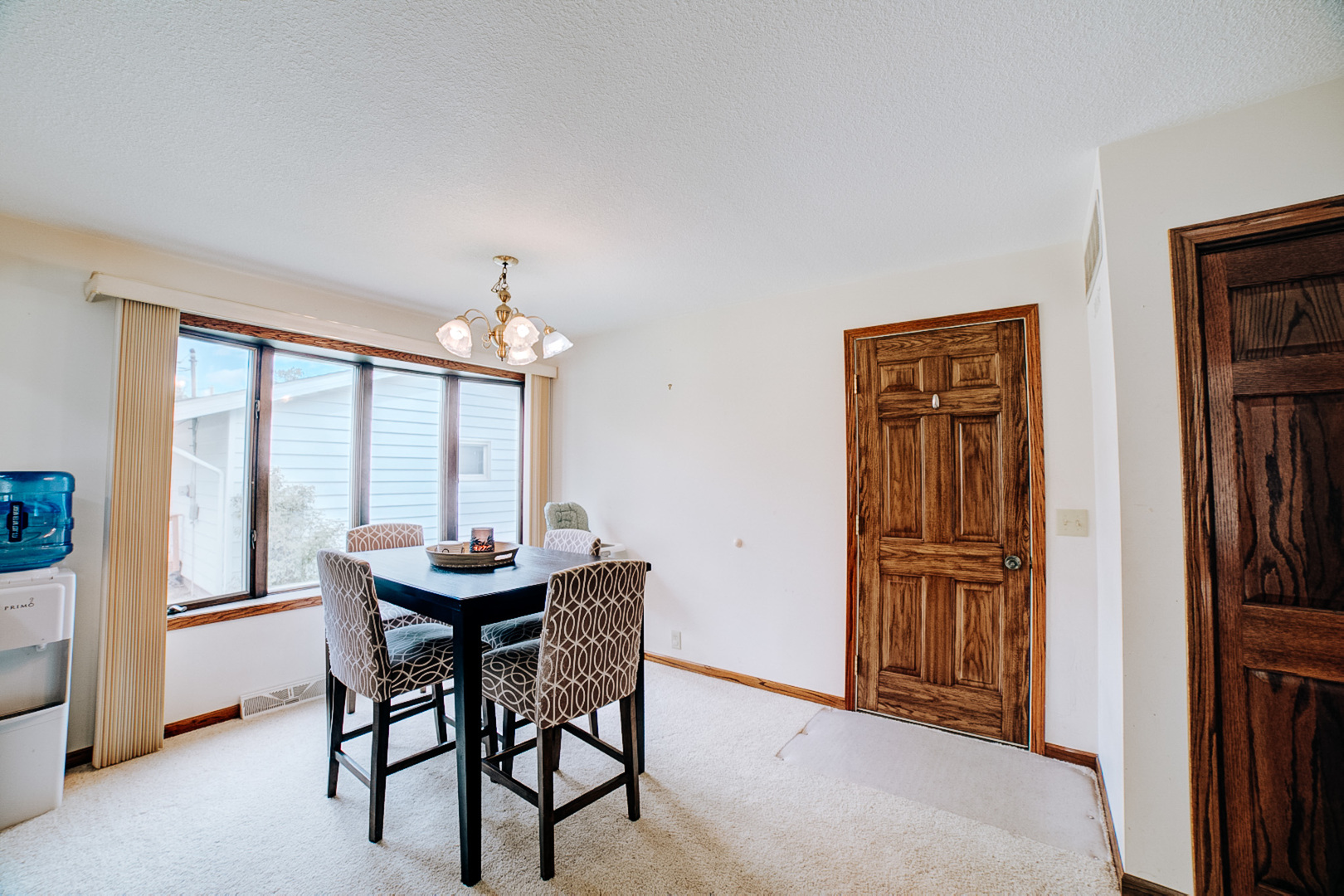 905 South 4th Street Watseka, IL 60970 - Photo 14 of 29 a dining room with furniture window and wooden floor