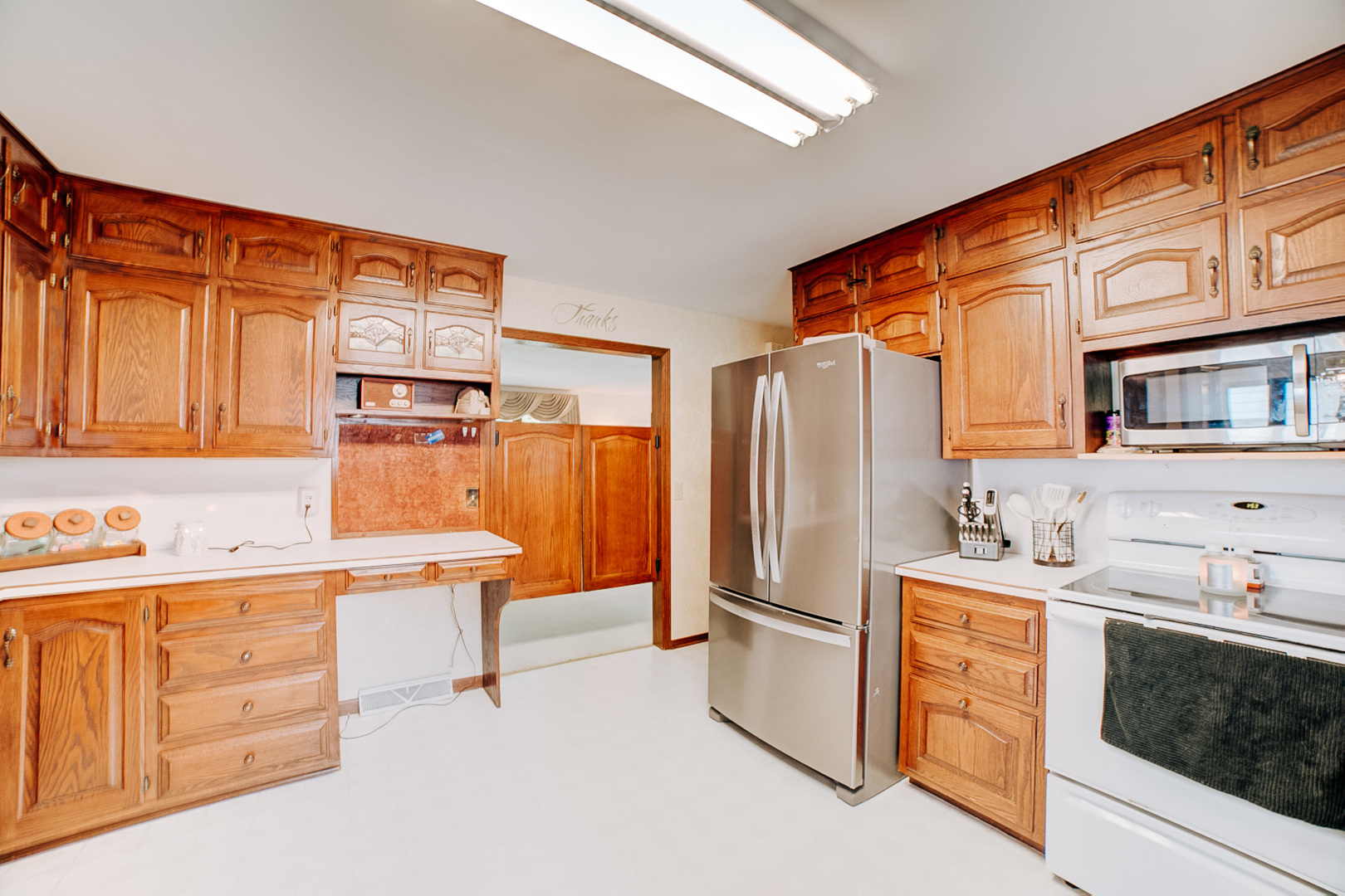905 South 4th Street Watseka, IL 60970 - Photo 9 of 29 a kitchen that has a sink cabinets and stainless steel appliances