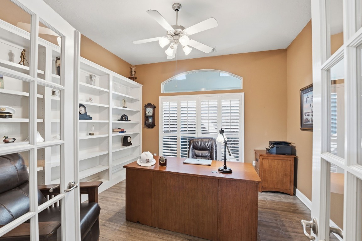99 Bagpipe Way Conroe, TX 77384 - Photo 17 of 40 a living room with furniture and a large window