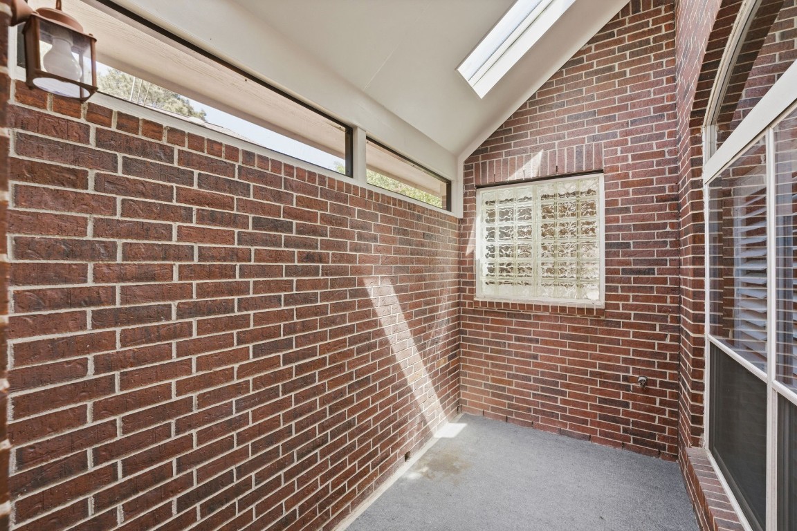 99 Bagpipe Way Conroe, TX 77384 - Photo 22 of 40 a view of a brick wall