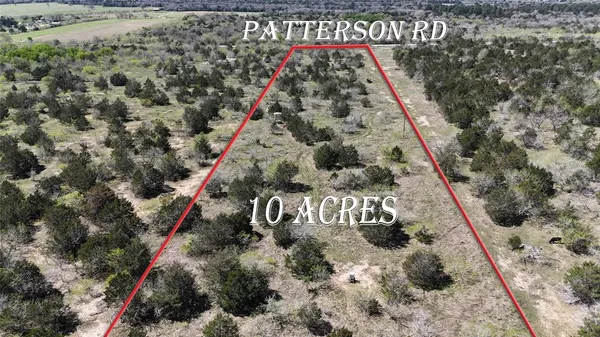 a view of a very nice looking covered with wooden fence