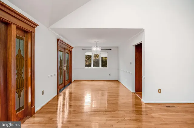 a view of an empty room and window