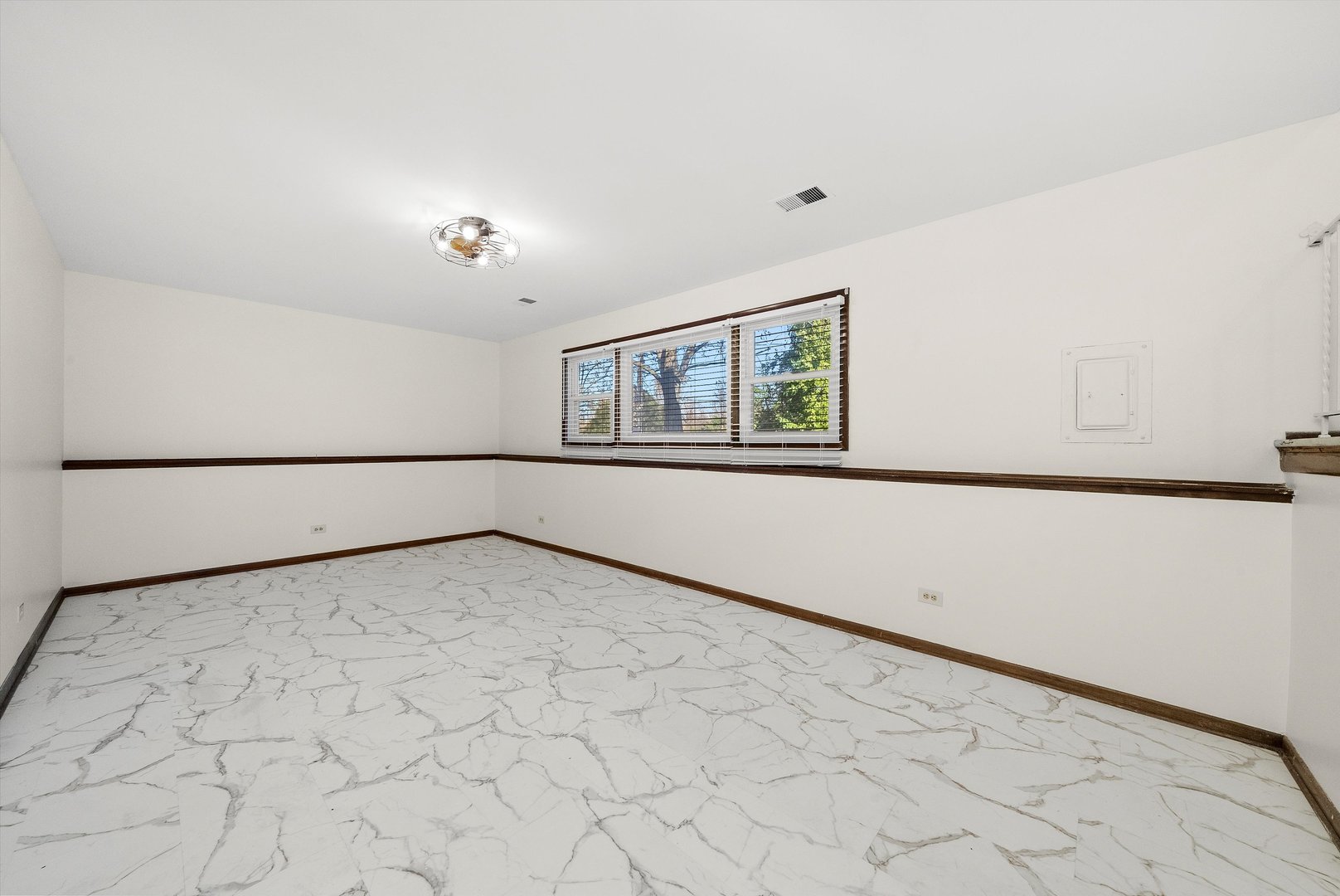 17731 Larkspur Lane Homewood, IL 60430 - Photo 15 of 38 a view of an empty room with a window