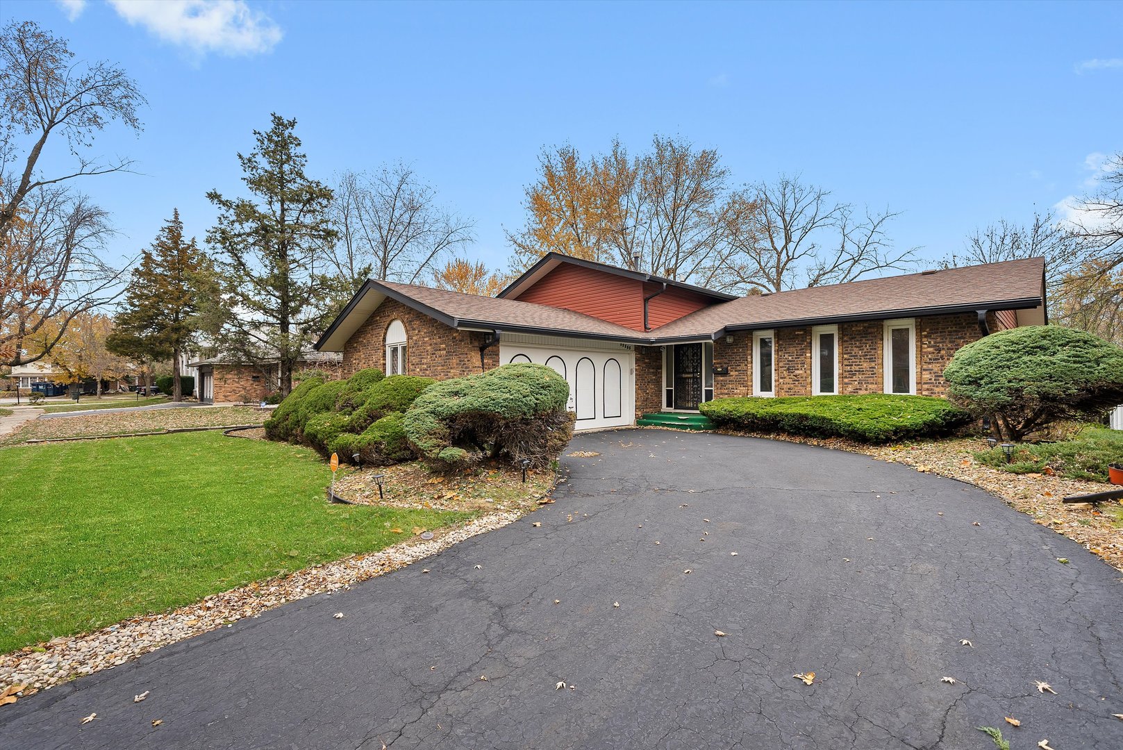 17731 Larkspur Lane Homewood, IL 60430 - Photo 2 of 38 a front view of a house with a yard