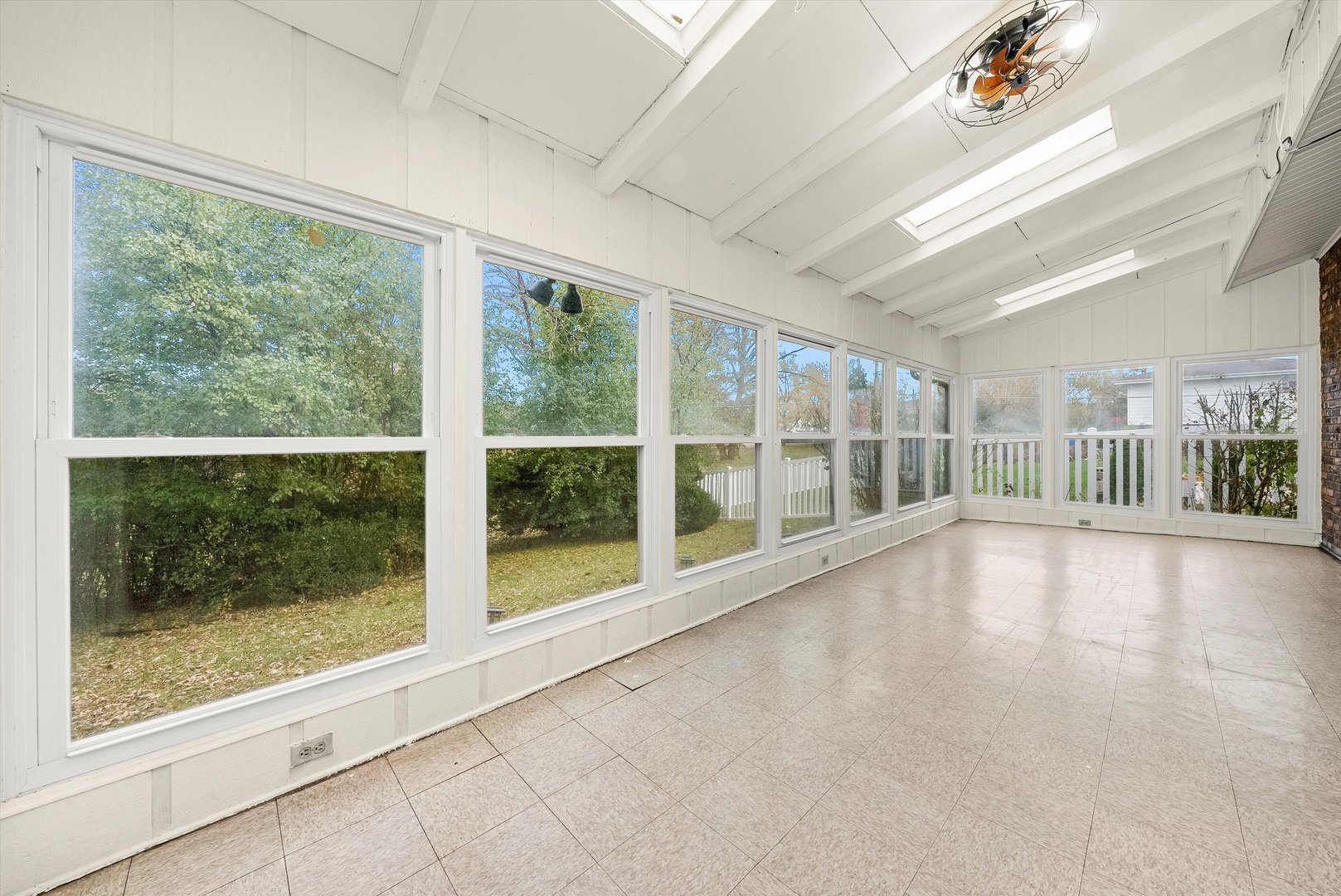 17731 Larkspur Lane Homewood, IL 60430 - Photo 22 of 38 a view of an empty room with wooden floor and a window