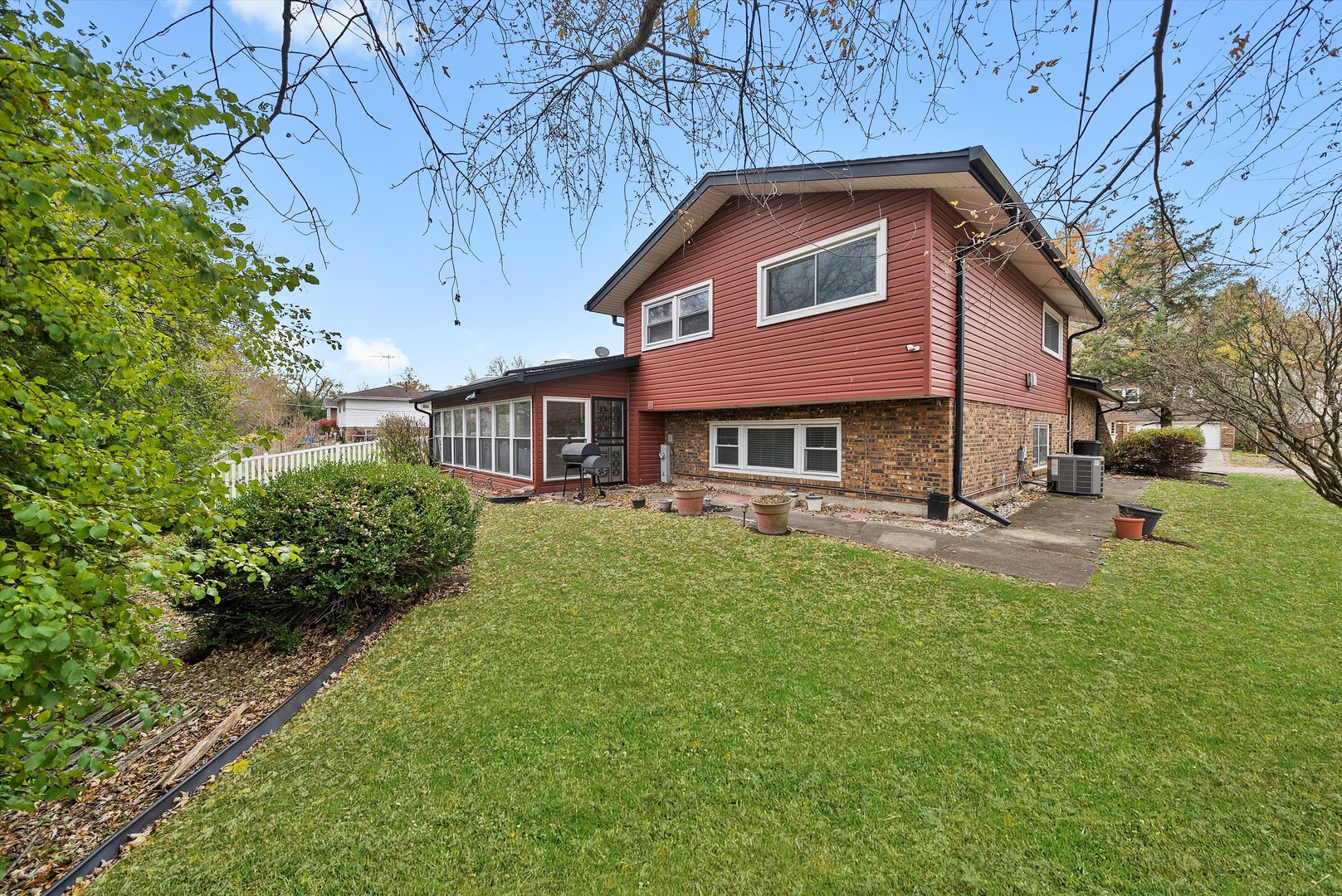 17731 Larkspur Lane Homewood, IL 60430 - Photo 26 of 38 a front view of a house with a yard