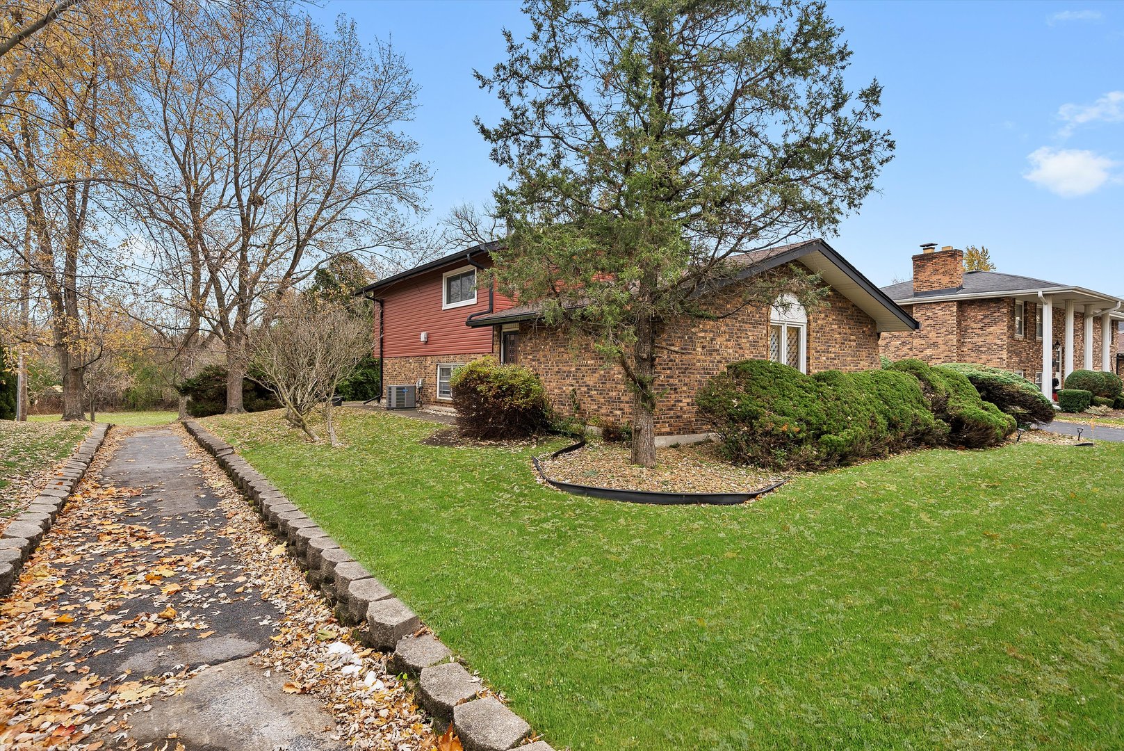 17731 Larkspur Lane Homewood, IL 60430 - Photo 29 of 38 a view of a house with a yard and tree s