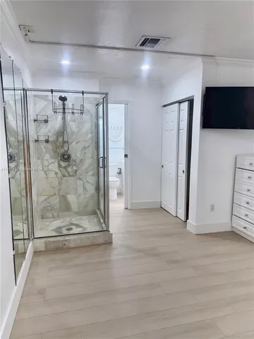 a view of a walk in closet