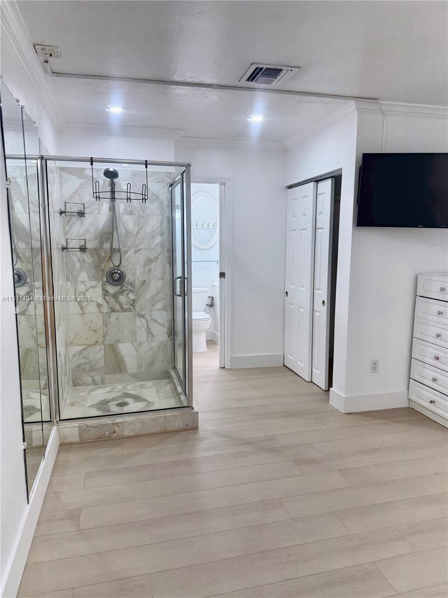 13008 Southwest 50th Lane, Unit 13008 Miami, FL 33175 - Photo 8 of 12 a view of a walk in closet